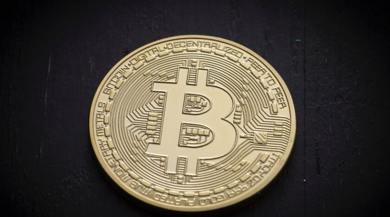 un-bitcoin-historico-alcanza-los-50.000-dolares-y-empieza-a-convencer-a-los-gigantes-de-la-industria-financiera